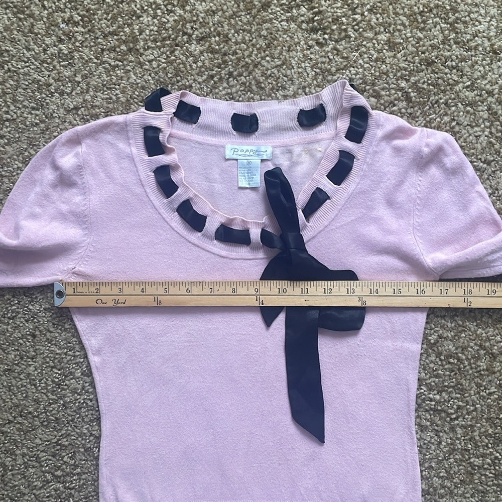 Pink sweater with black tie along neckline - Picture 6 of 11